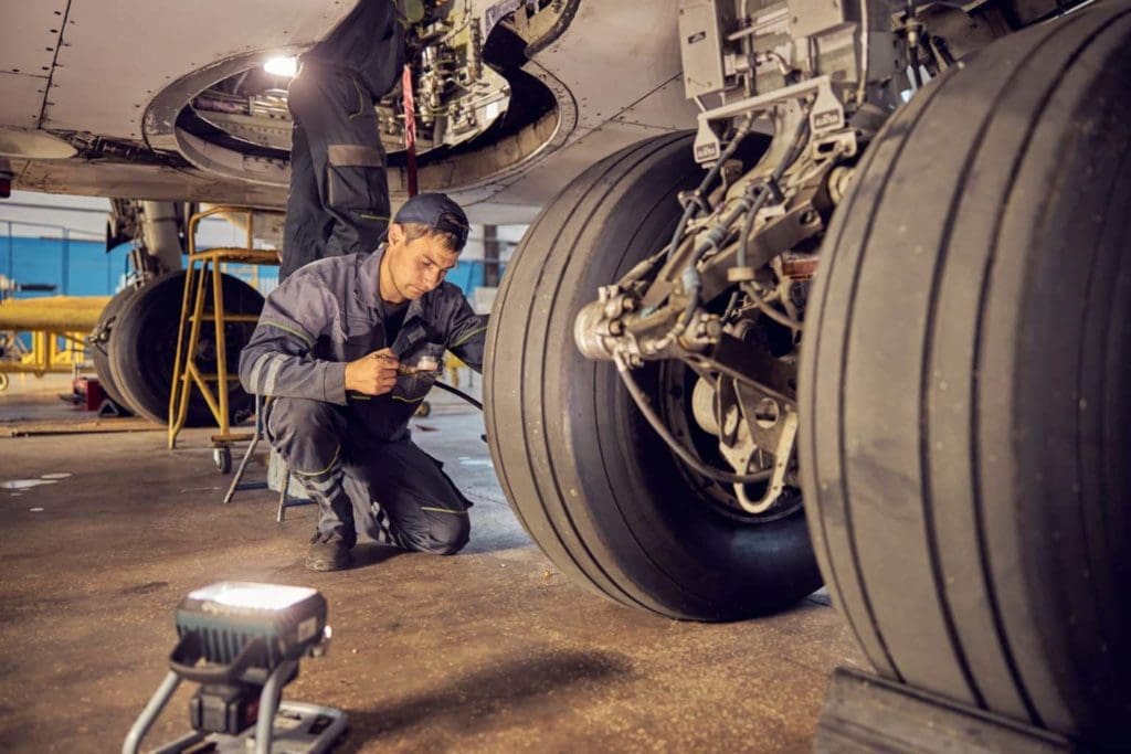 Technicians working on aircraft