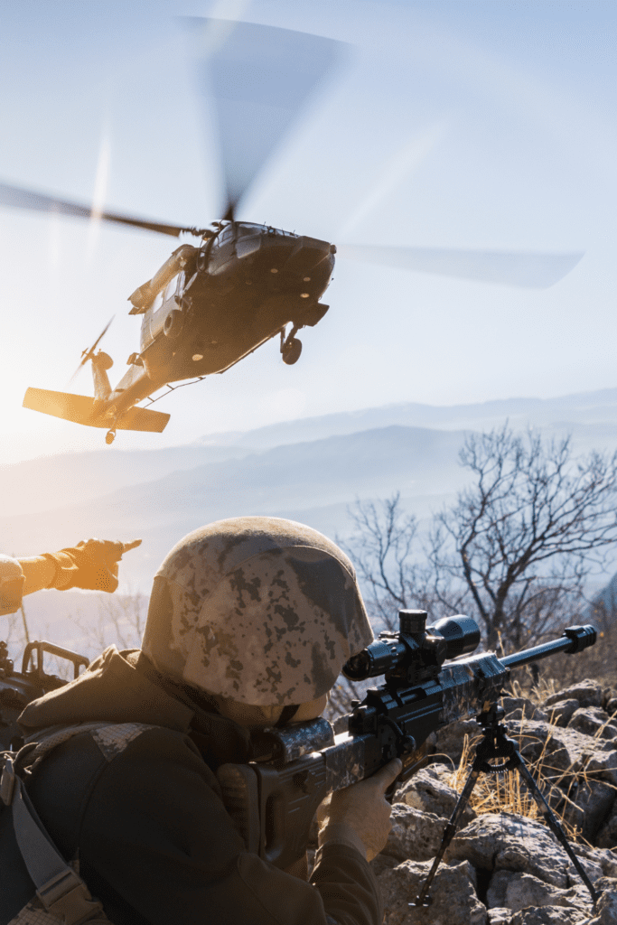 Soldiers on the ground with a helicopter in the air